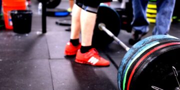 one arm dumbbell triceps extension